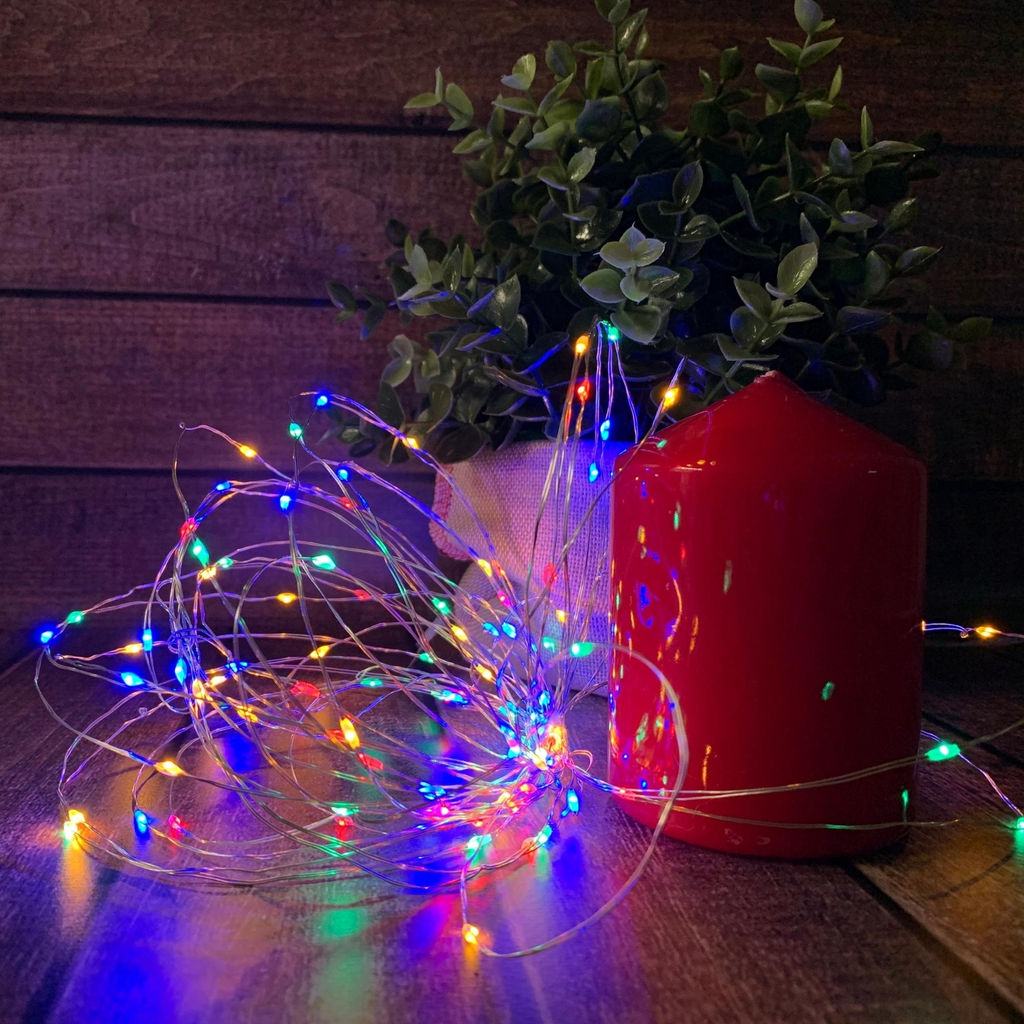 ULD-S1000-100/DTA/RC RGB IP44 Гирлянда светодиодная, 10м. 100 светодиодов. RGB свет. Пульт ДУ (в/к). Провод прозрачный. ТМ Uniel