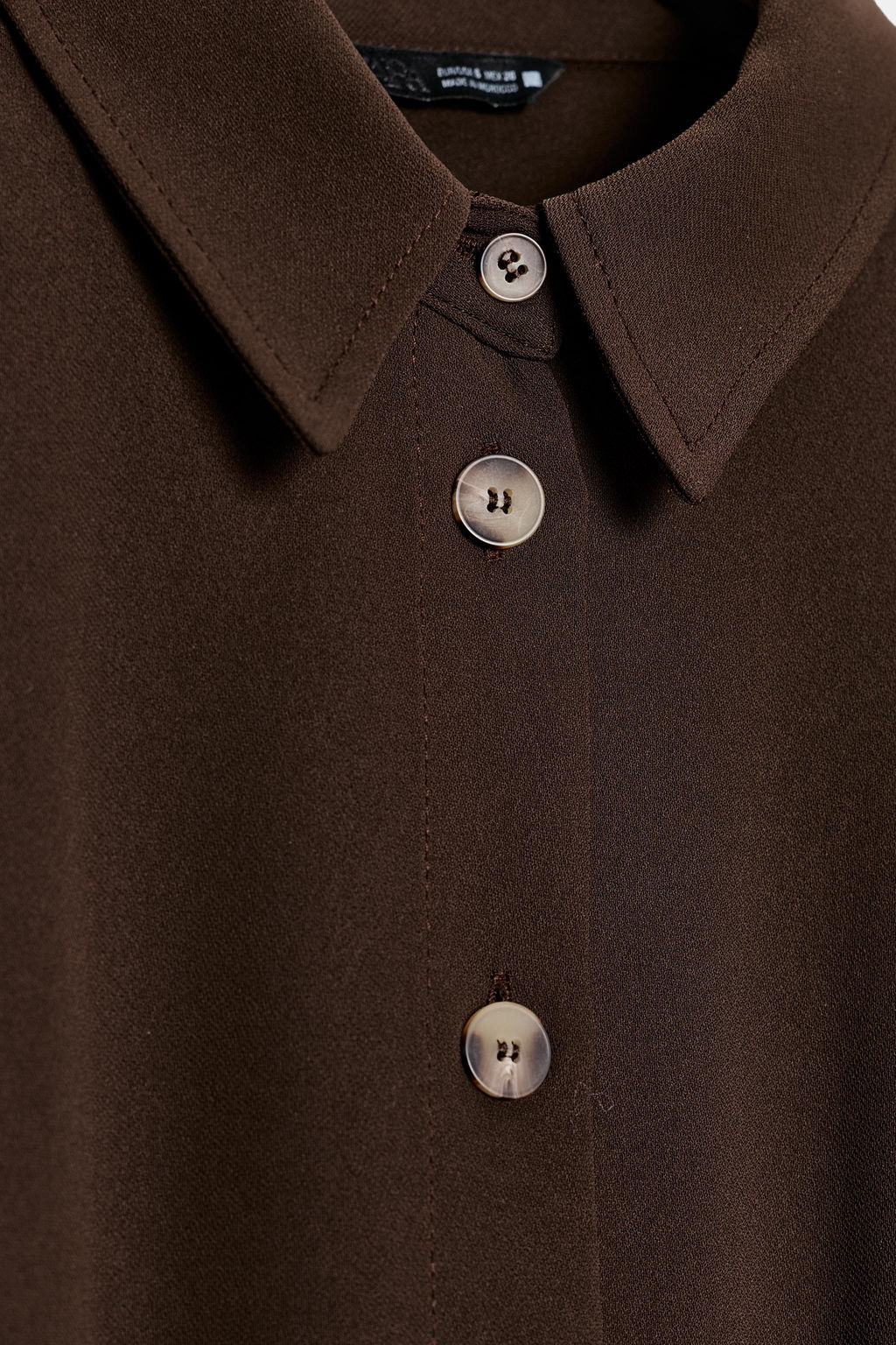 SHIRT WITH SHOULDER TABS