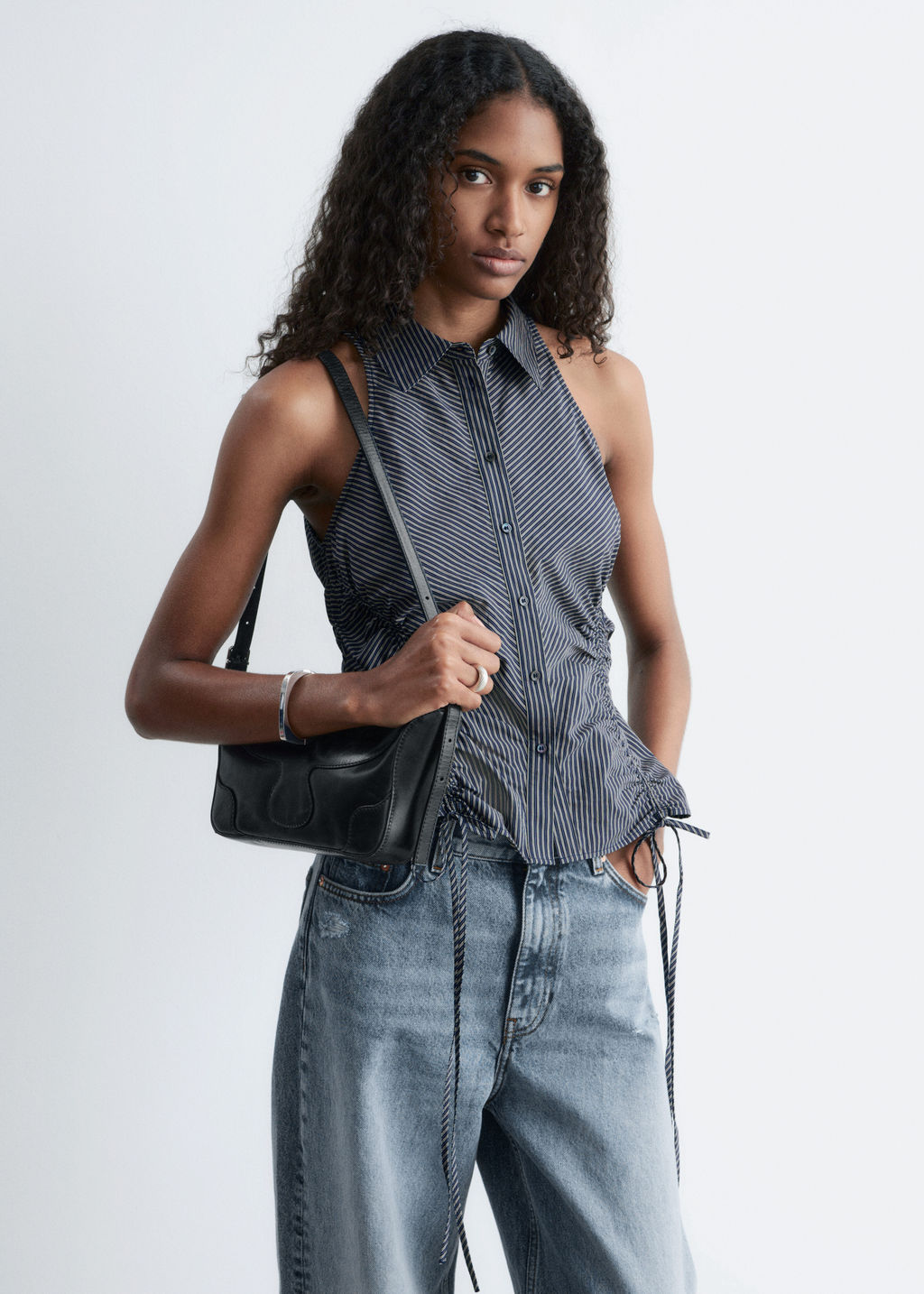 Top sin mangas con cord?n de ajuste - H&m фото 2
