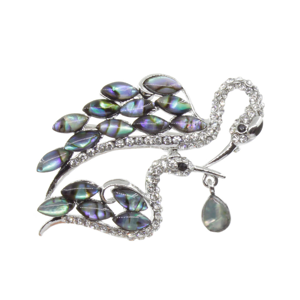 Брошь "Цапли" со вставками из гелиотиса и ювелирного сплава