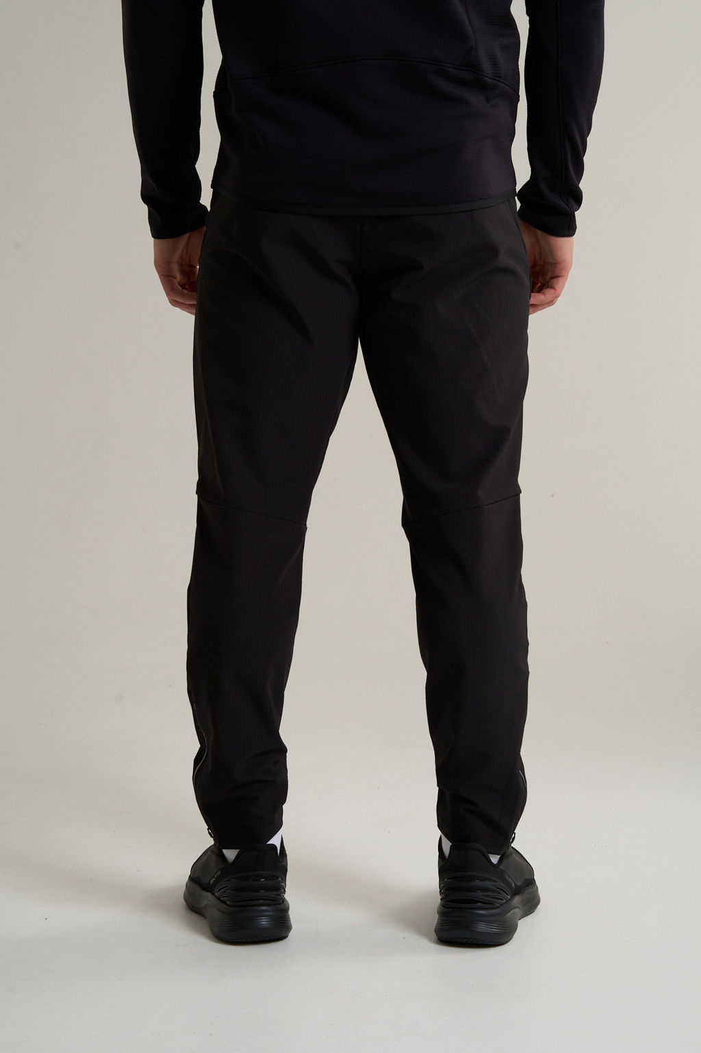 Брюки текстильные утепленные Черный ANTA RUNNING Woven Track Pants фото 6