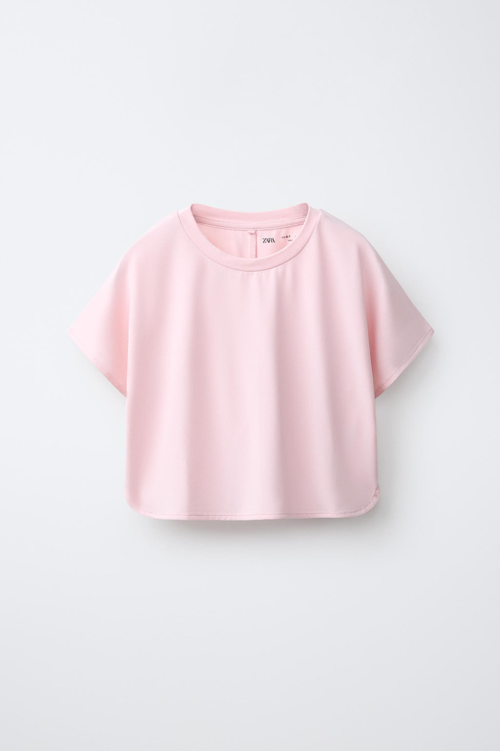 CAMISETA FLUIDA GYM CON MODAL / Rosa