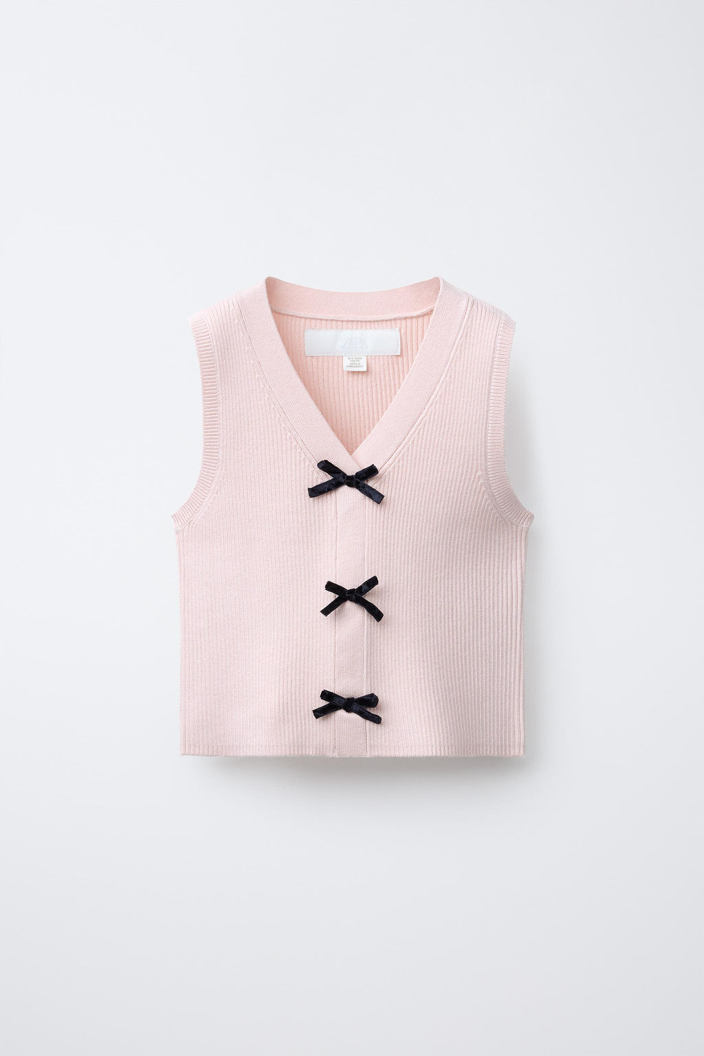 KNIT VEST WITH BOWS