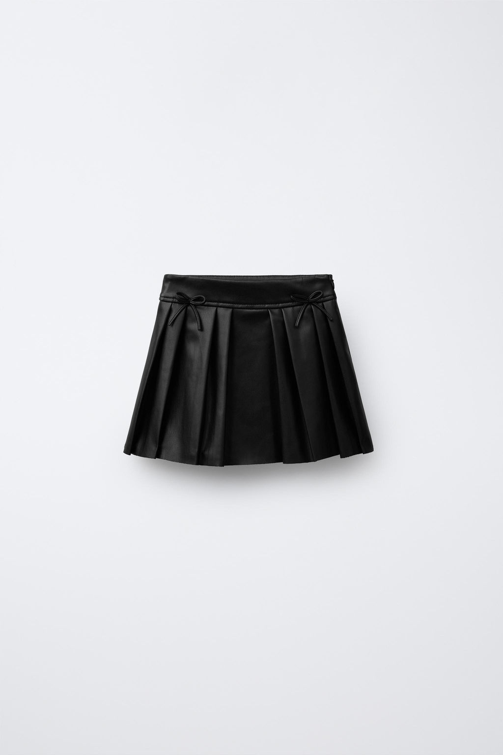 FAUX LEATHER BOX PLEAT SKIRT WITH BOWS