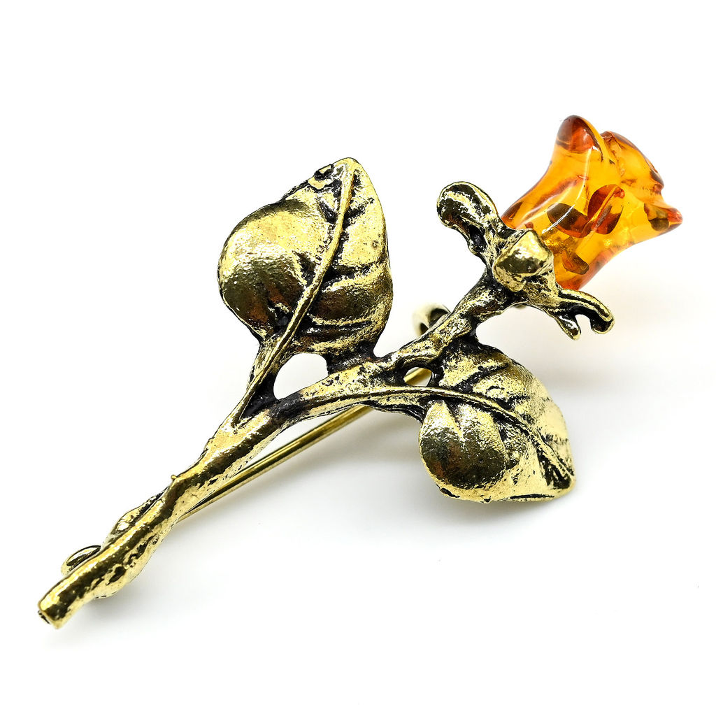 Брошь Роза с янтарем в металле 23*42мм коньячный