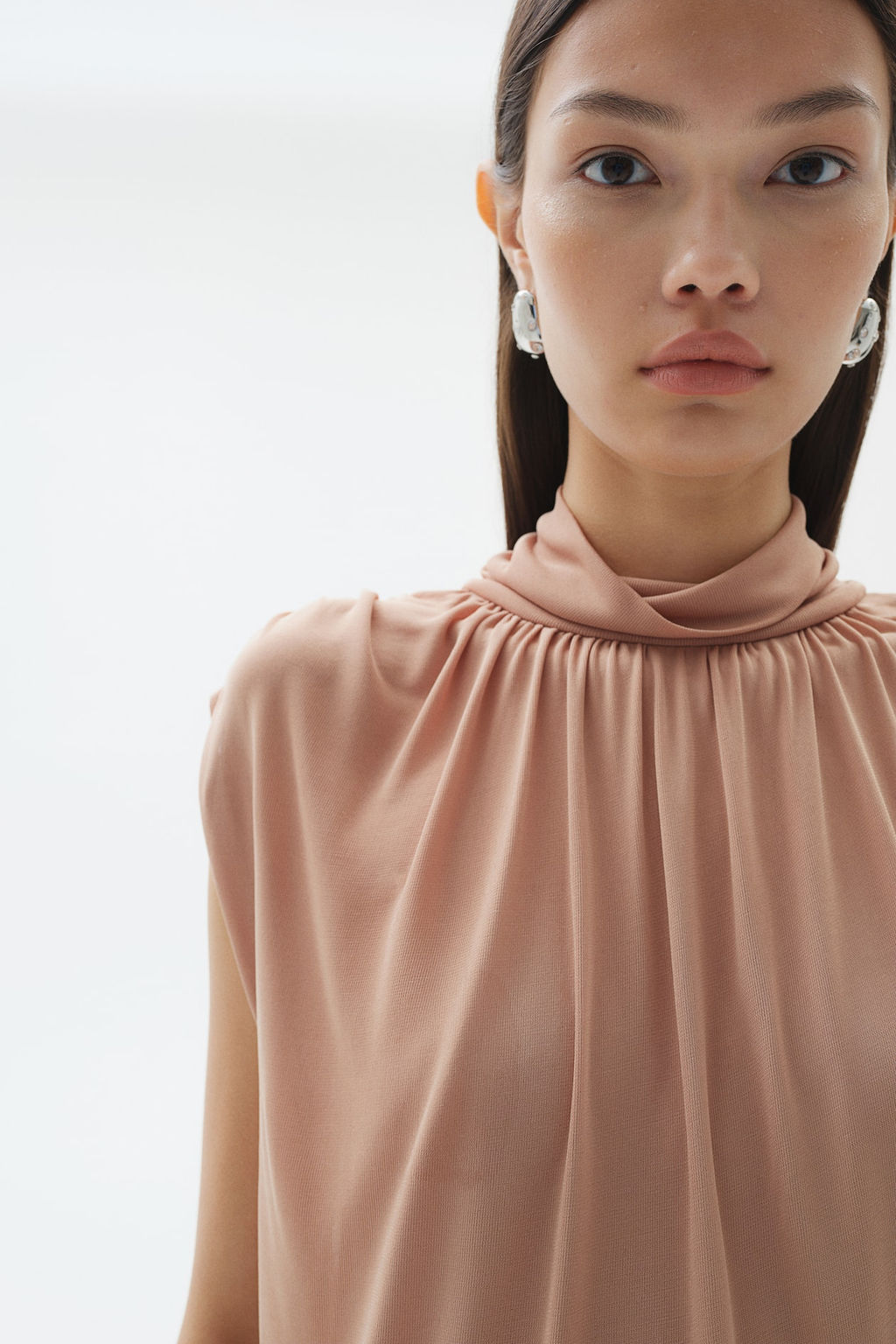 Top con cuello perkins