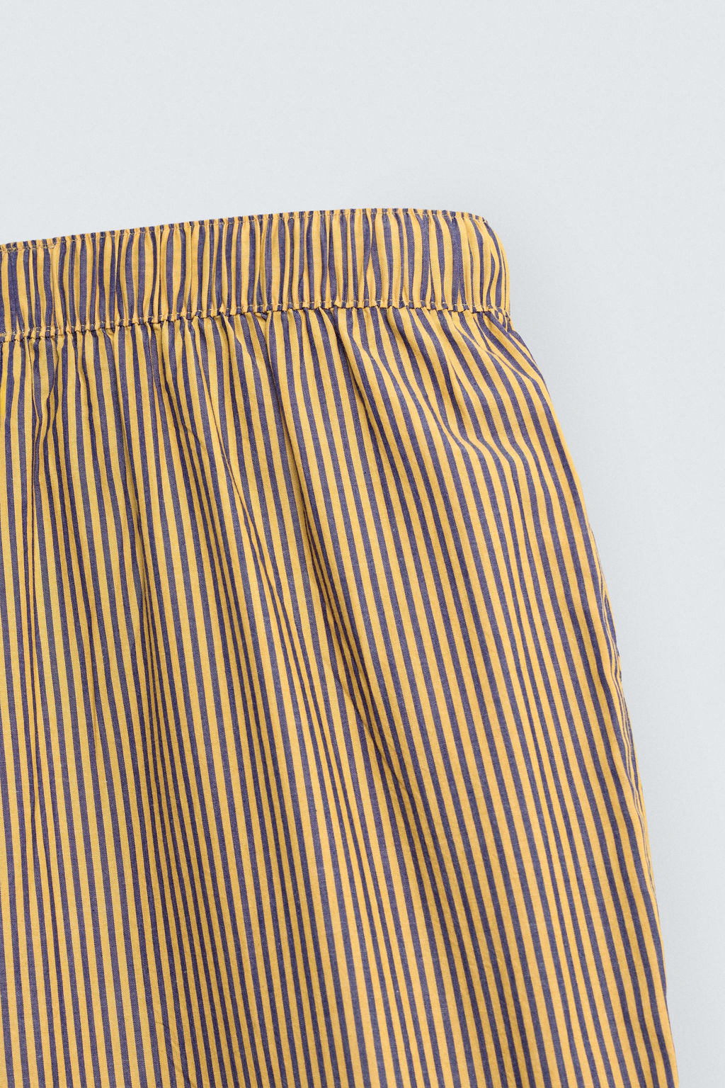 STRIPED OVERSIZE FIT TROUSERS