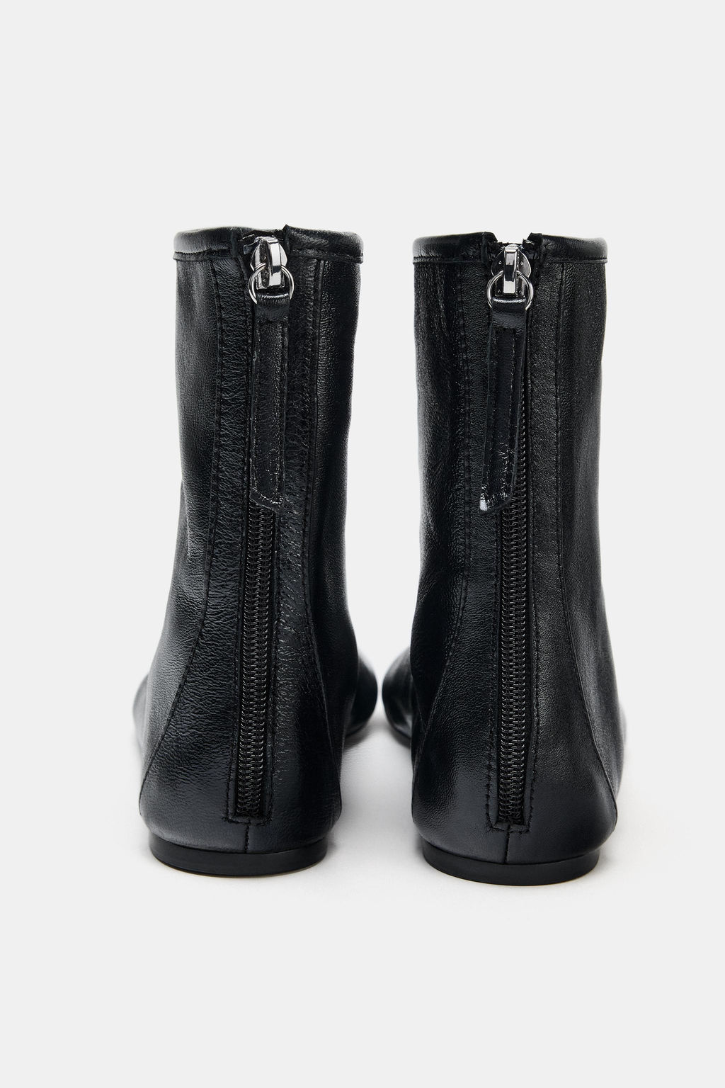 FLAT LEATHER ANKLE BOOTS