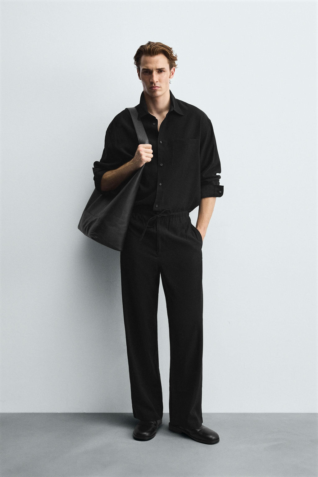RELAXED FIT FLOWING TROUSERS