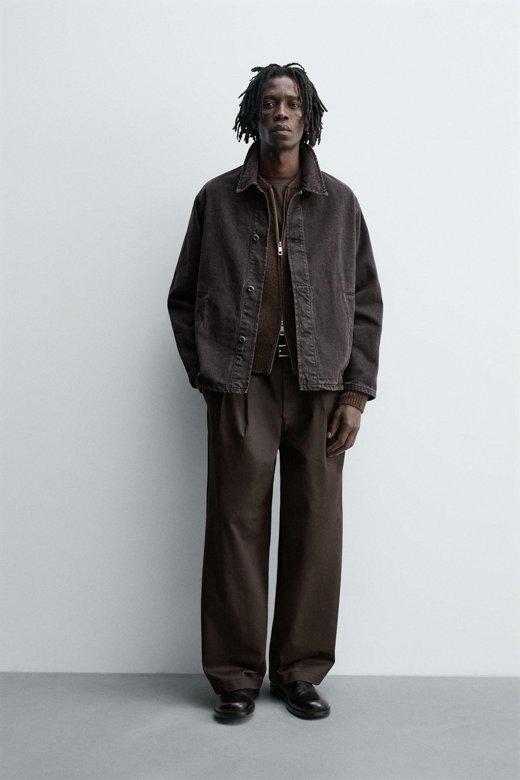 PLEATED CHINO TROUSERS