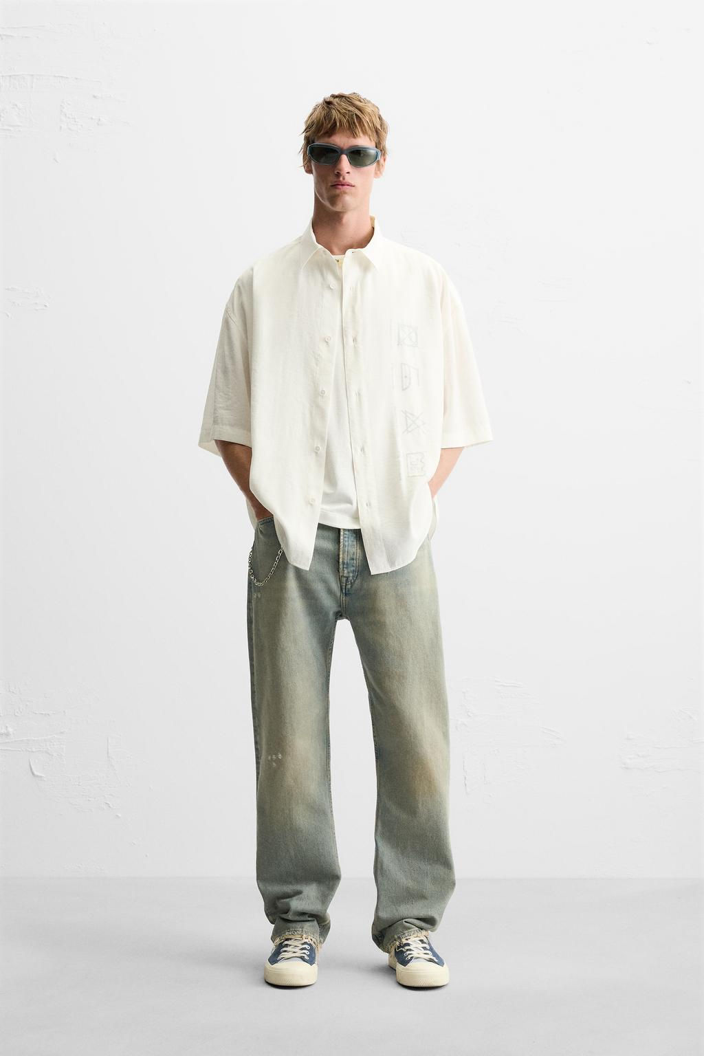 OVERSIZE SHIRT WITH SYMBOLS