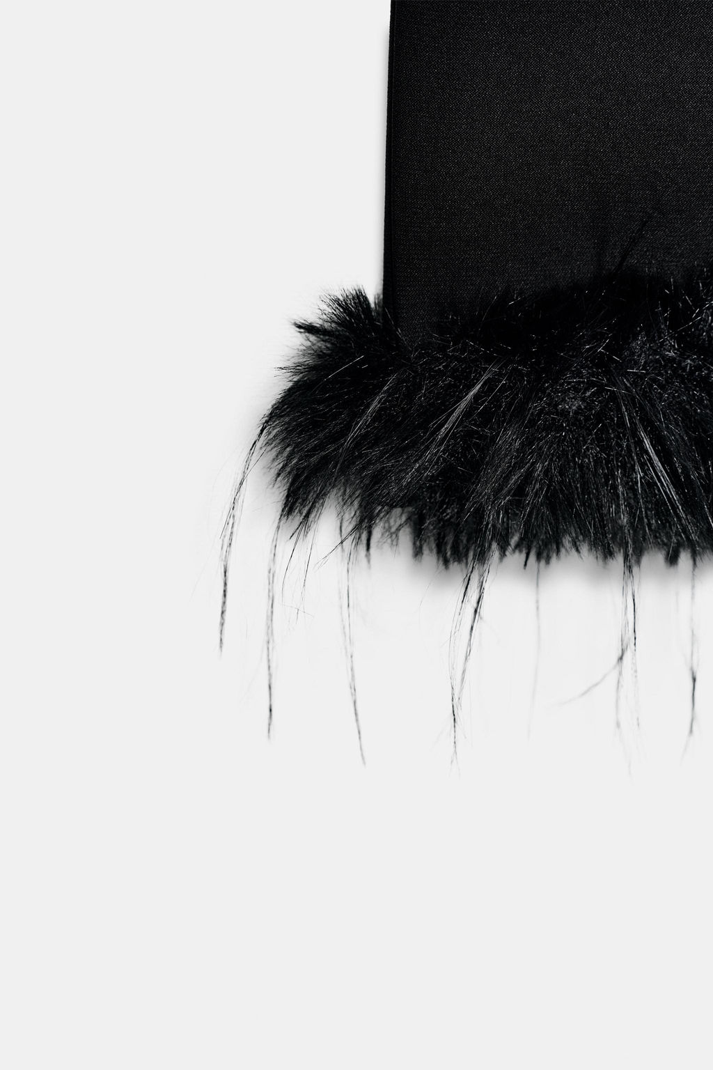 FLARE TROUSERS WITH FAUX FUR HEM