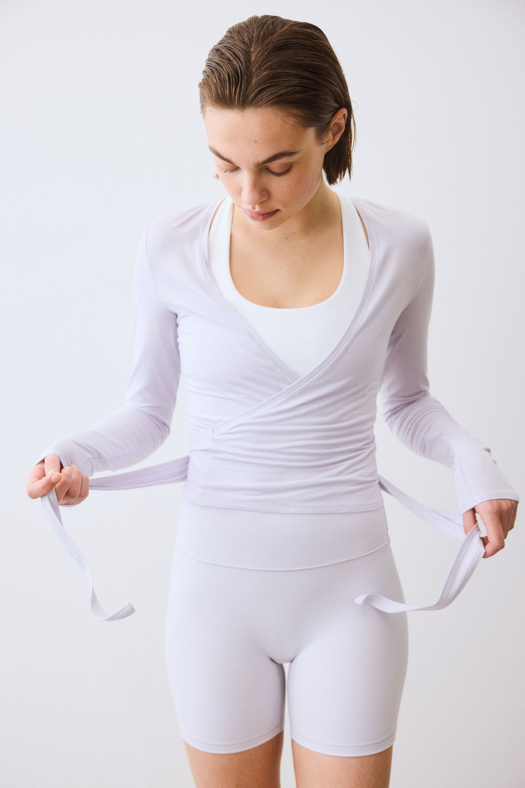 Top de deporte cruzado en modal - H&m фото 16