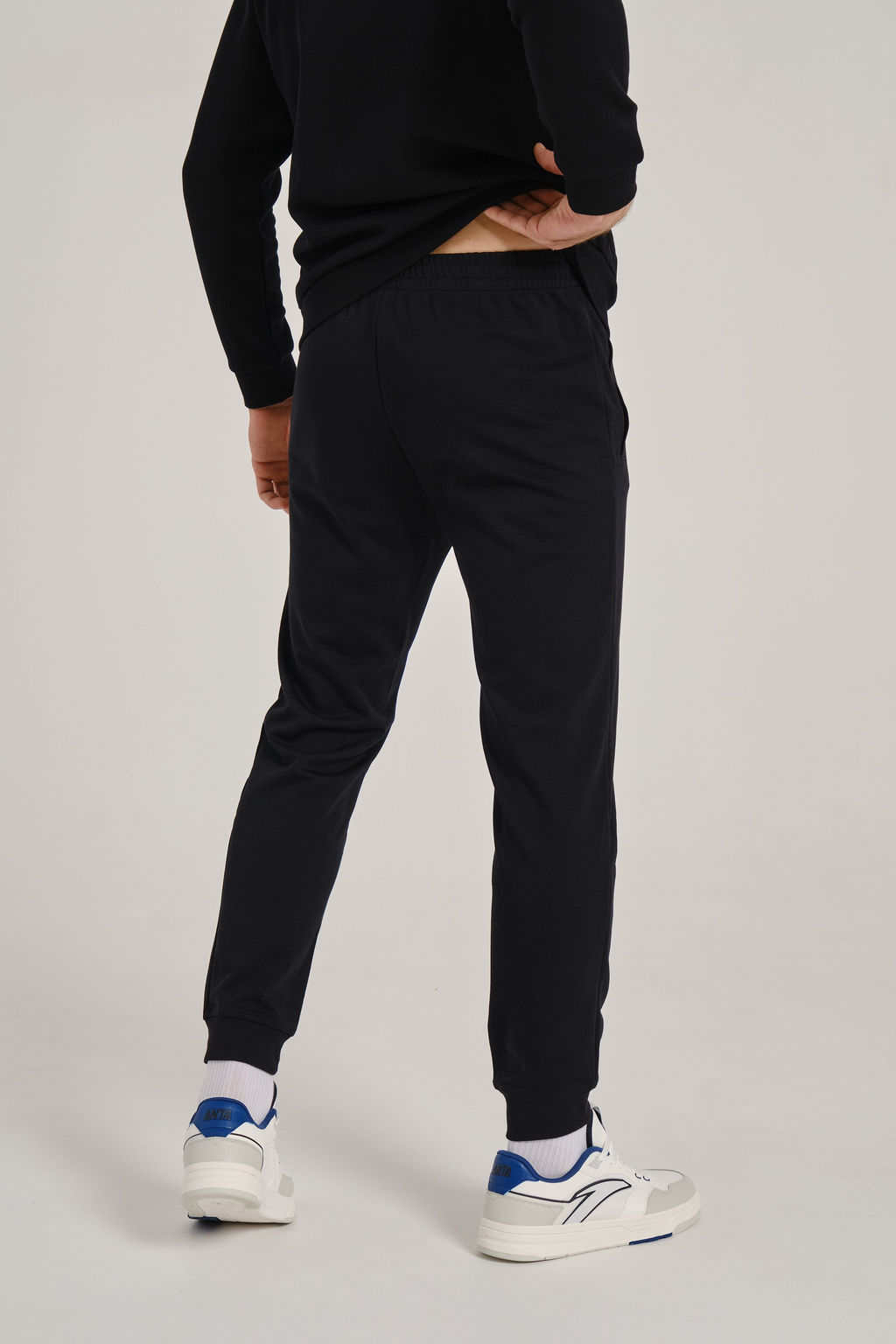 Брюки трикотажные Черный TRN ESSENTIAL Knit Track Pants - Anta фото 6