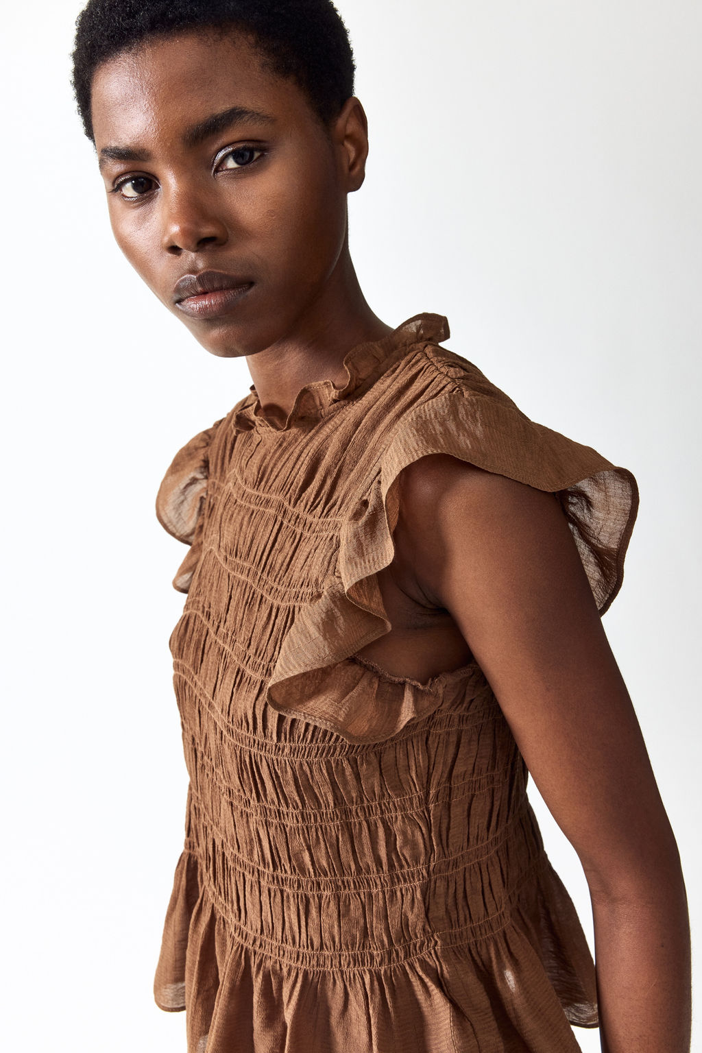 Top nido de abeja con peplum - H&m фото 4
