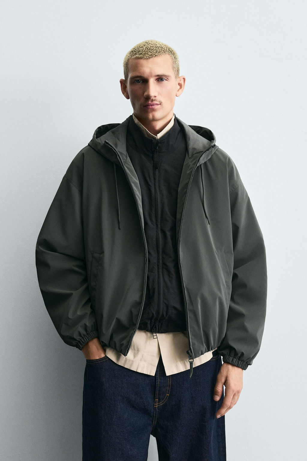 TECHNICAL HOODED JACKET