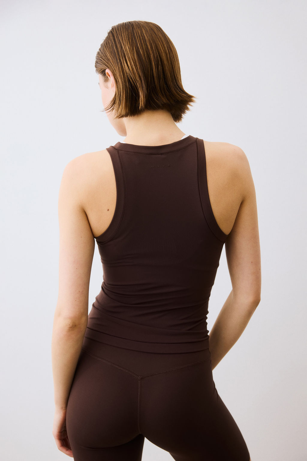 Top de deporte con SoftMove Slim Fit - H&m фото 7