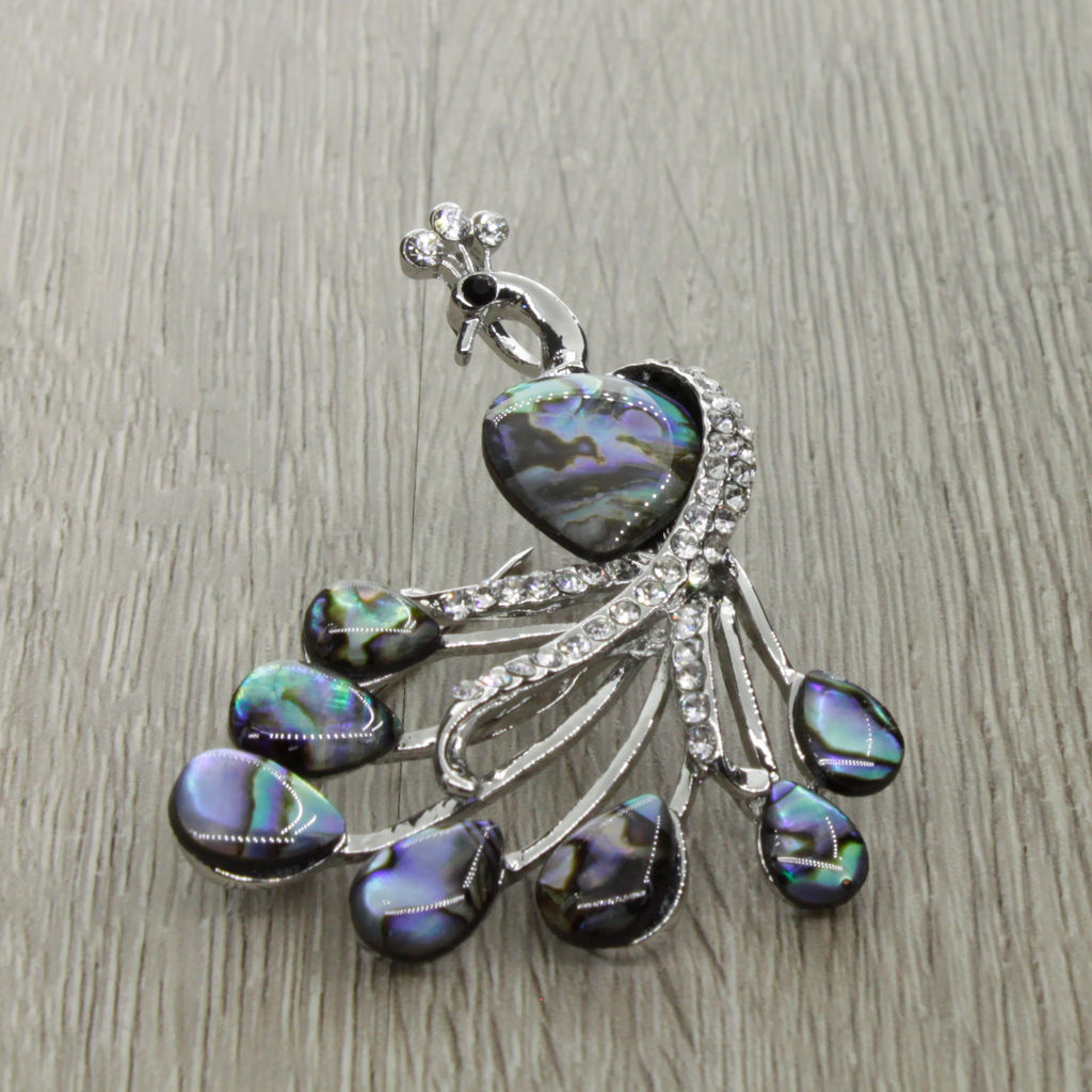 Брошь-подвеска "Жар-птица" со вставками из гелиотиса и ювелирного сплава