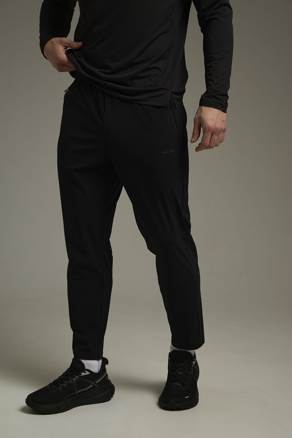 Брюки трикотажные укороченные Черный ADVANCED RUNNING Knit Ankle Pants - Anta фото 2