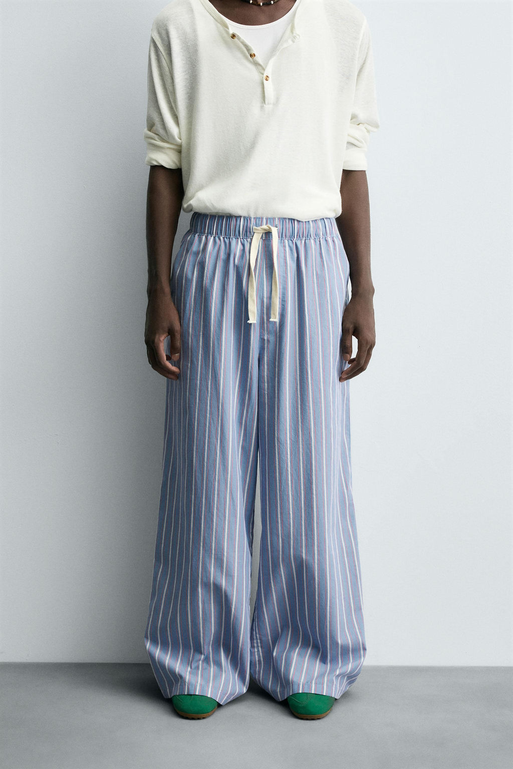 STRIPED OVERSIZE FIT TROUSERS