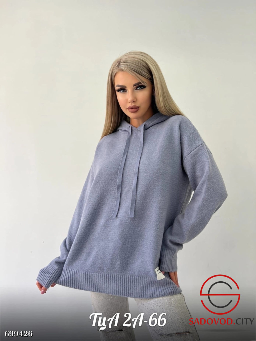 Женский удлиненный свитер