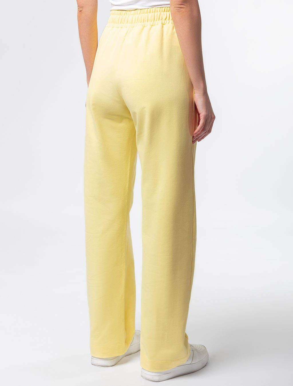 Брюки из эластичного футера с молниями на карманах