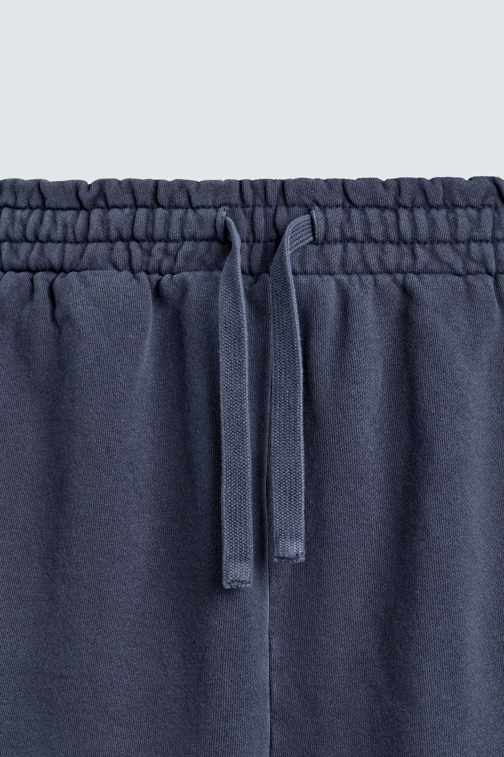 BERMUDA JOGGER B?SICA LAVADA / Azul?n