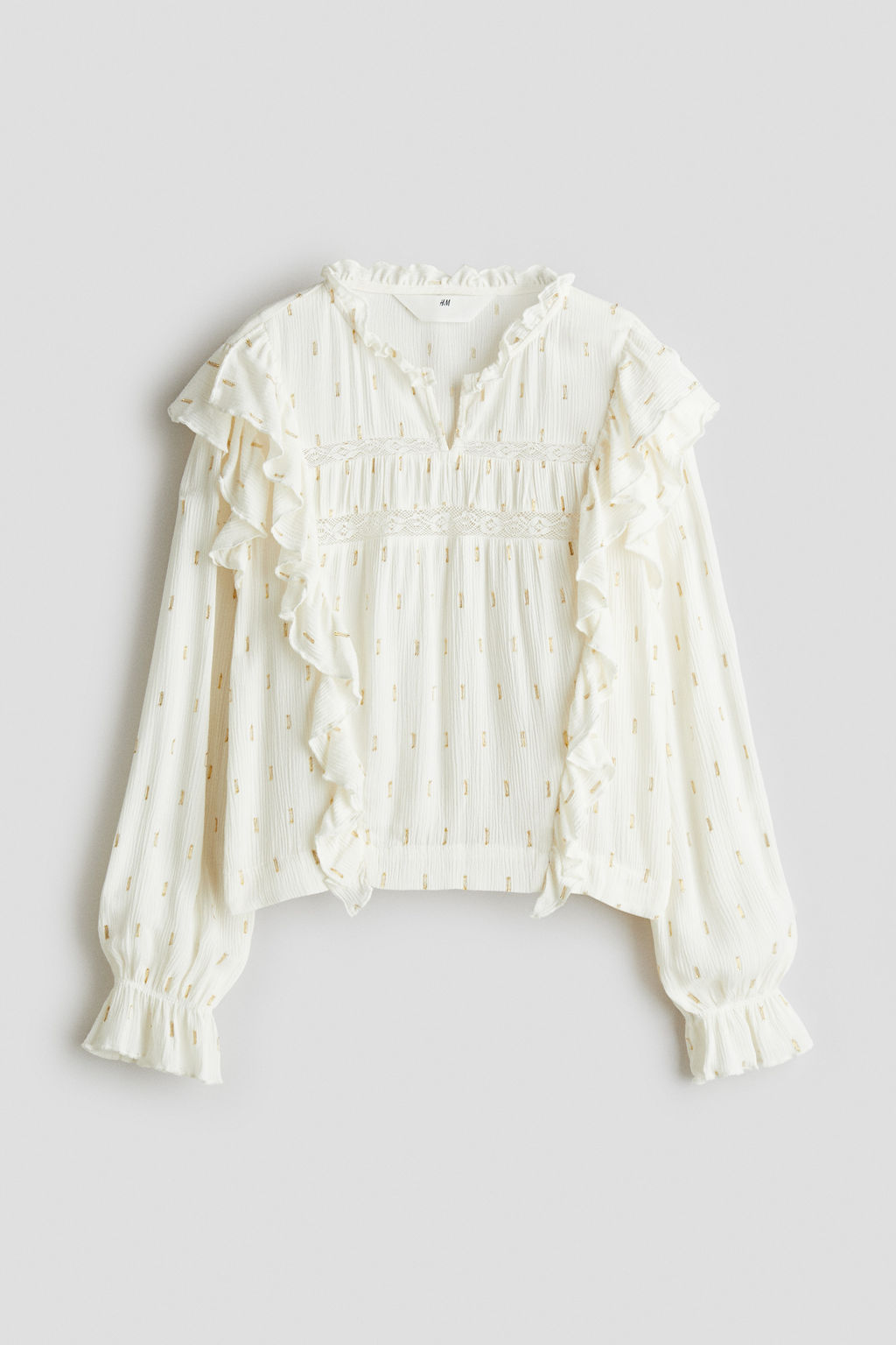 Blusa con ribetes de volante