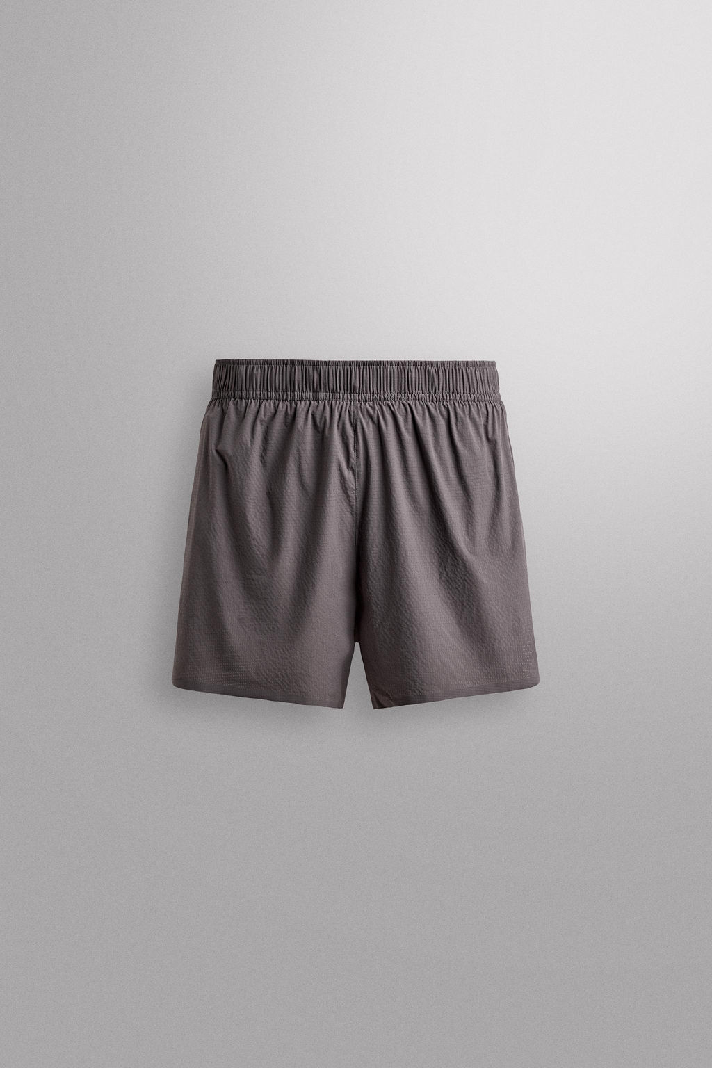PANTALONES CORTOS LIGEROS RUNNING 3" / Morado