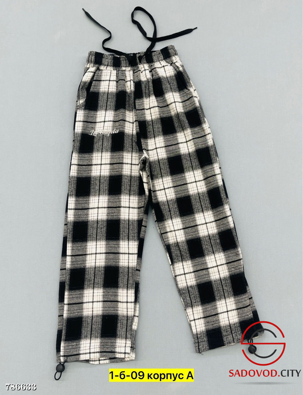 Брюки в клетку для девочки