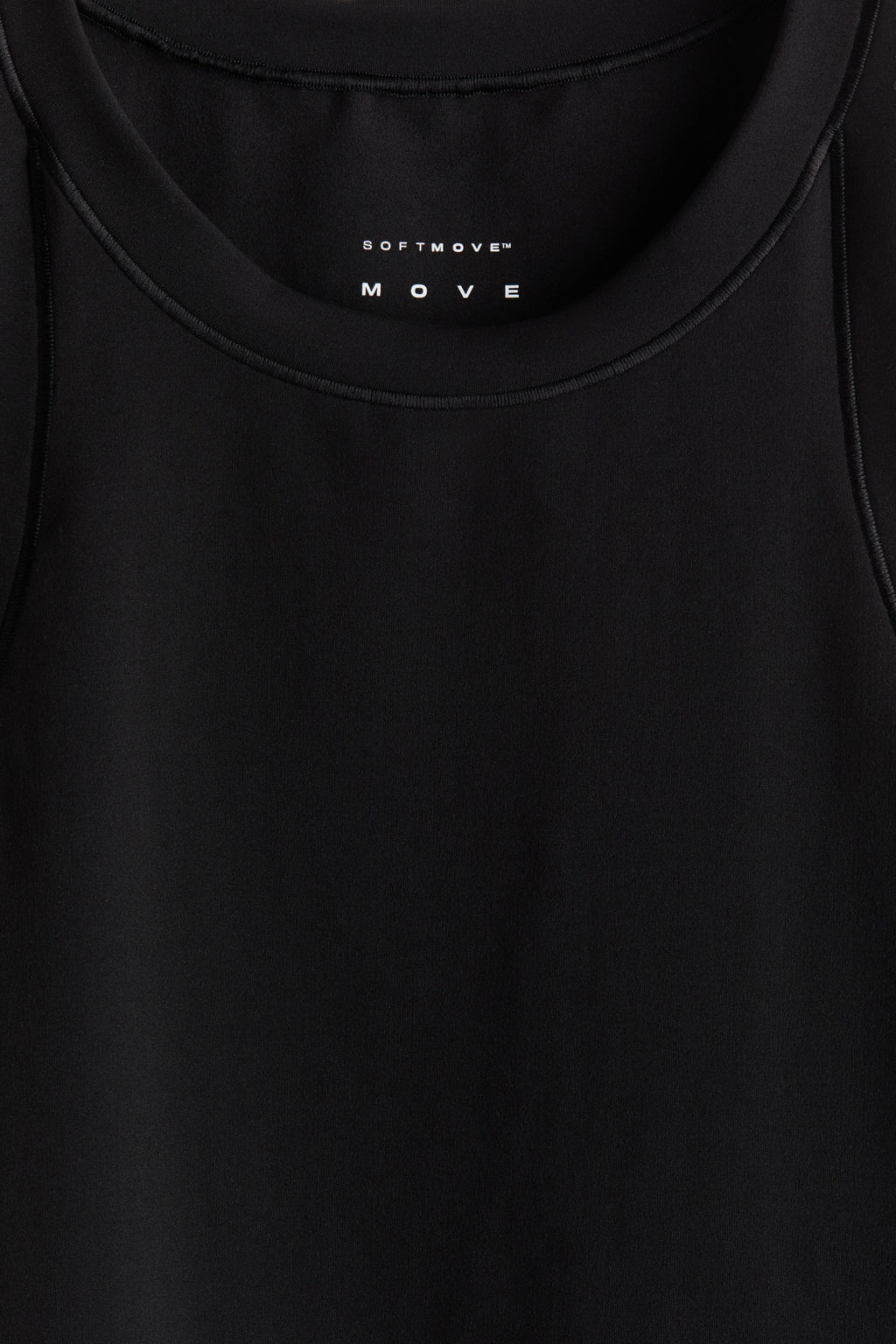 Top de deporte con SoftMove Slim Fit - H&m фото 9
