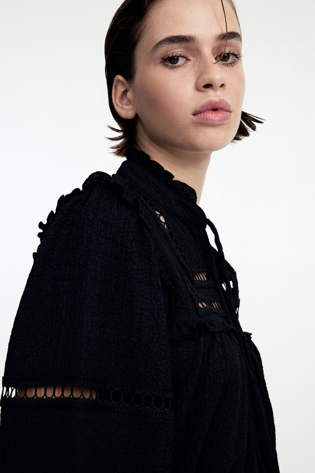 Blusa oversize con ribetes de volante