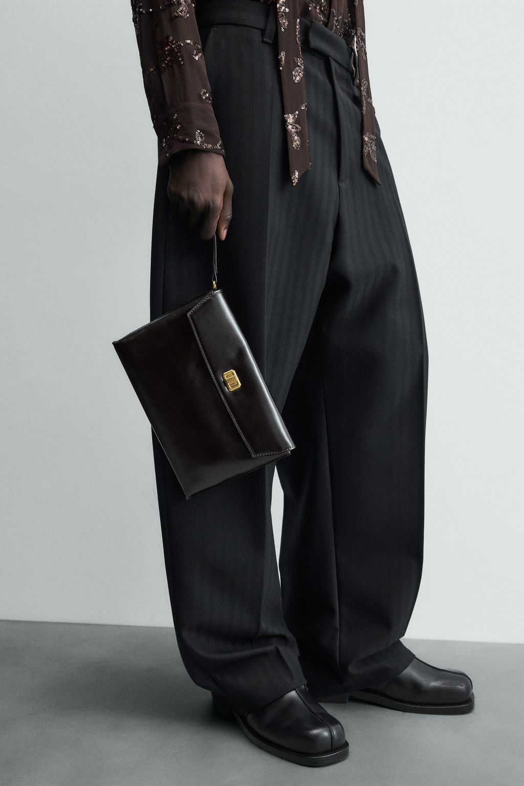 LIMITED EDITION LEATHER CLUTCH BAG