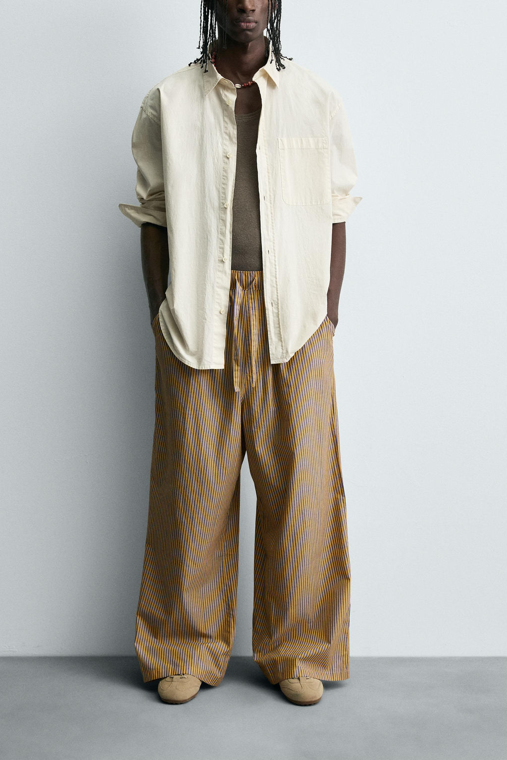 STRIPED OVERSIZE FIT TROUSERS