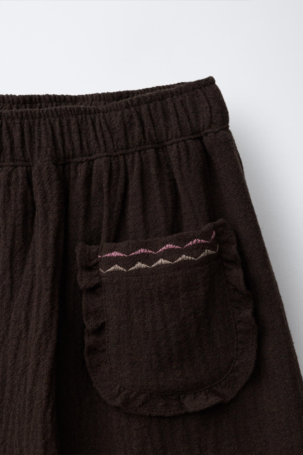 RUFFLED POCKET BERMUDA SKORT