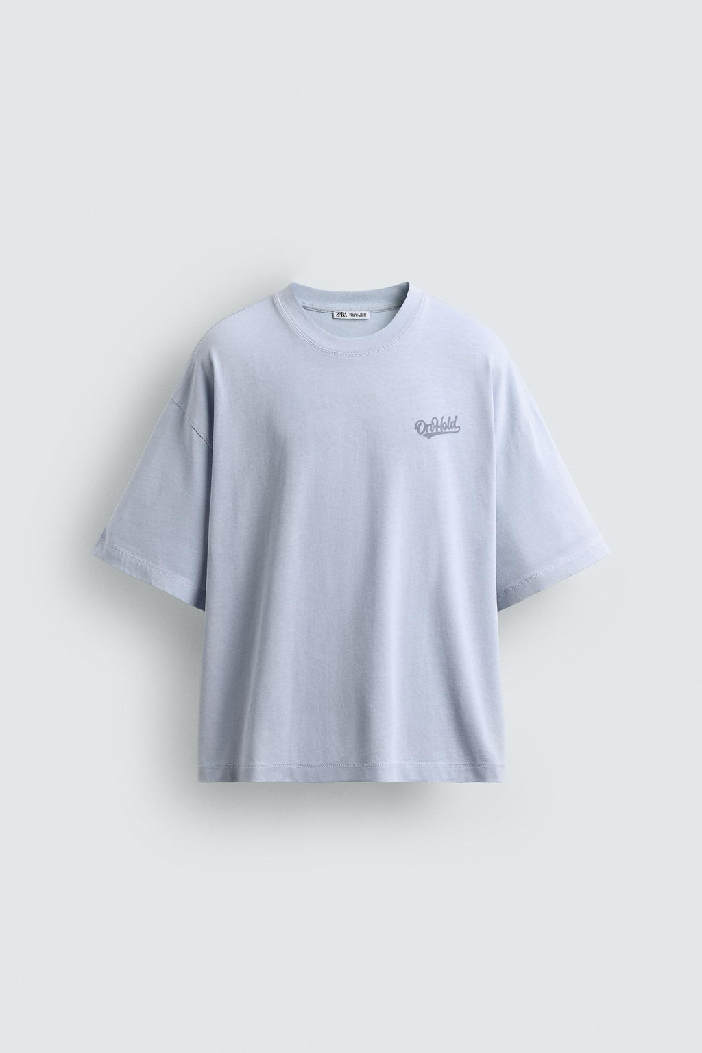 CAMISETA BOXY FIT PARCHES COMBINADOS / Azul claro