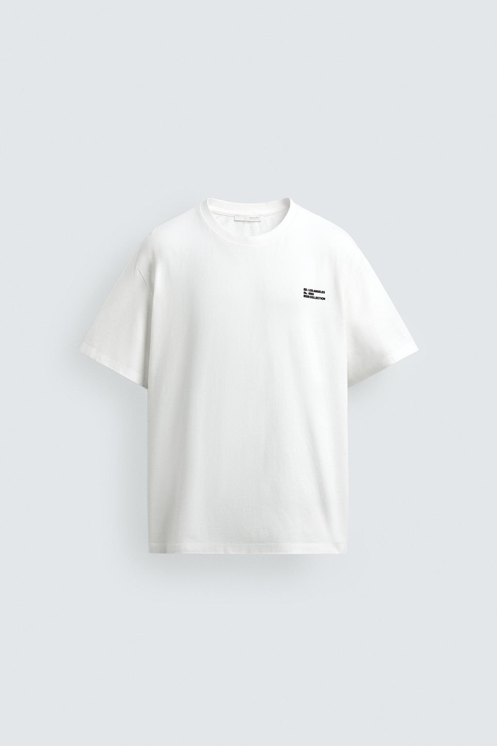 CAMISETA RELAXED FIT TEXTO PARCHES / Blanco