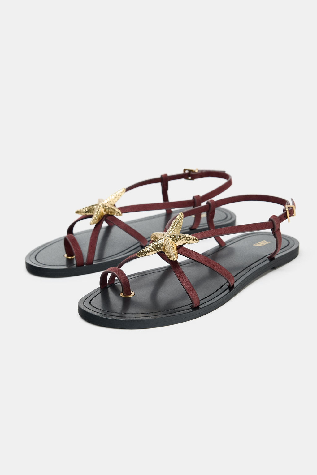 STRAPPY SANDALS WITH METAL DETAIL