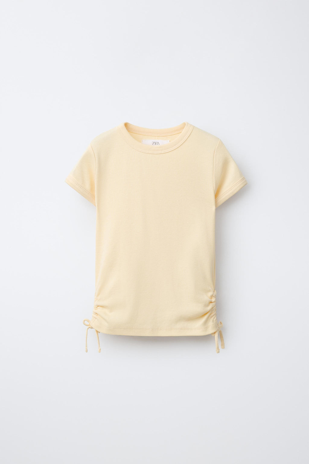 CAMISETA CON MODAL CUT OUT LAZOS / Amarillo