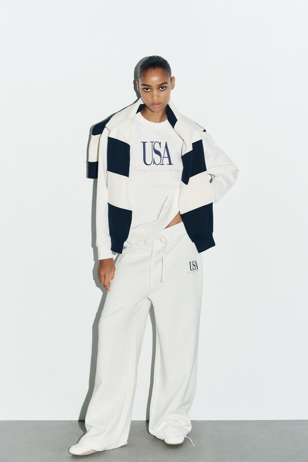COTTON EMBROIDERED TEXT TROUSERS