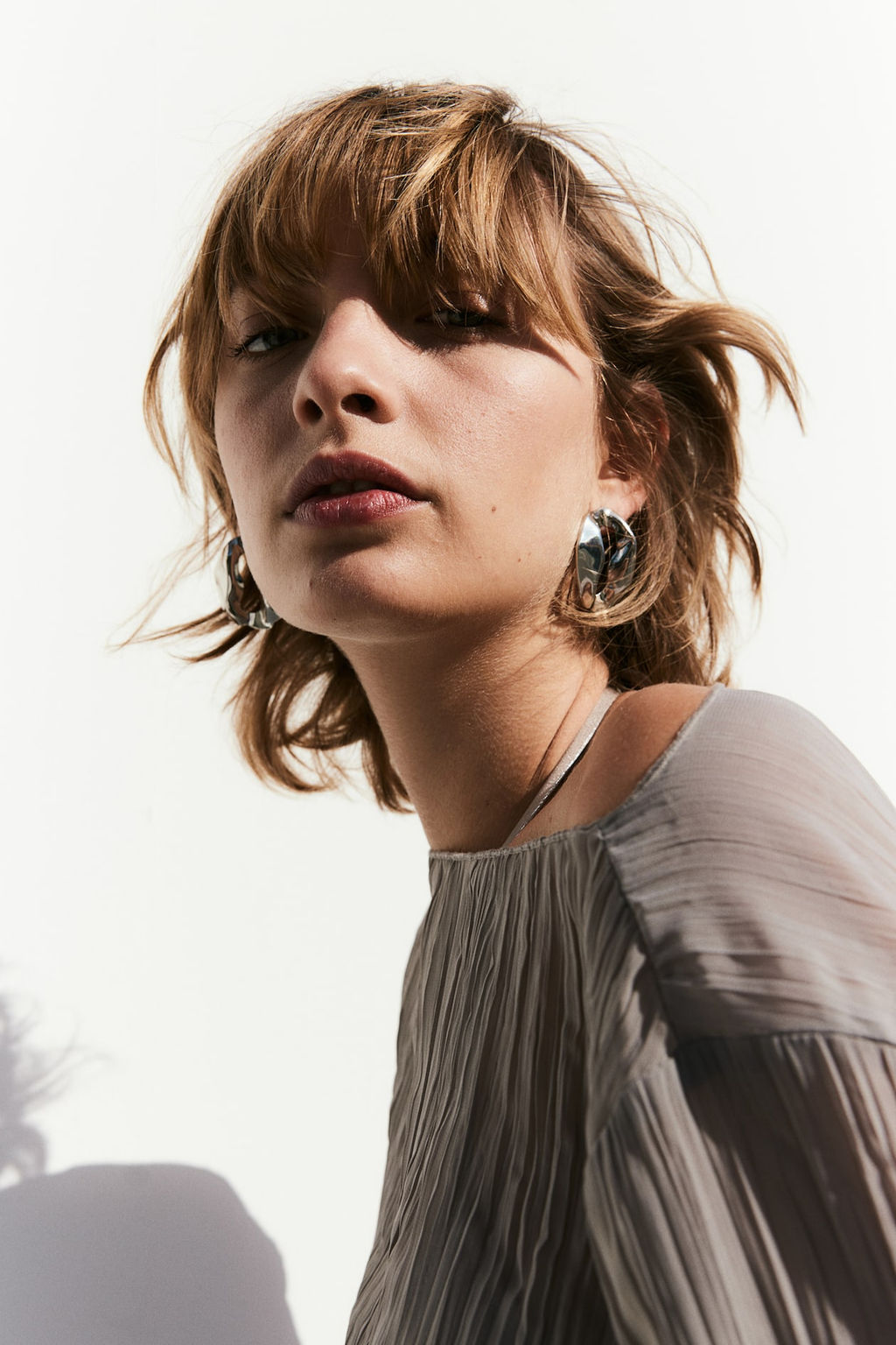 Top efecto arrugado con detalles sobrehilados - H&m фото 2