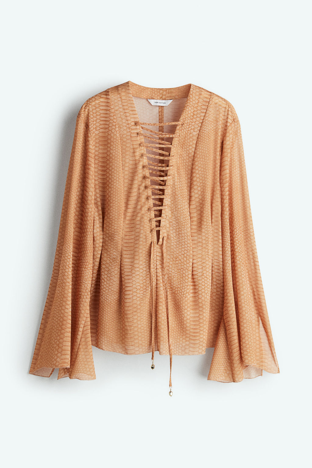 Blusa de gasa con lazada