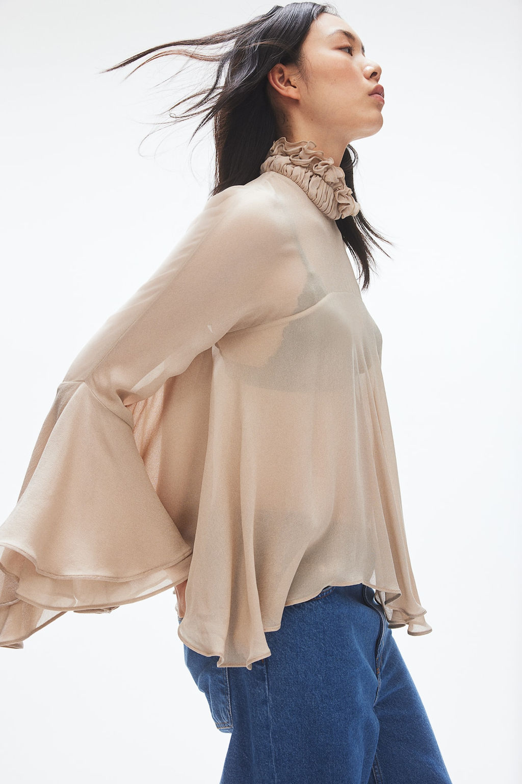 Blusa oversize con volantes