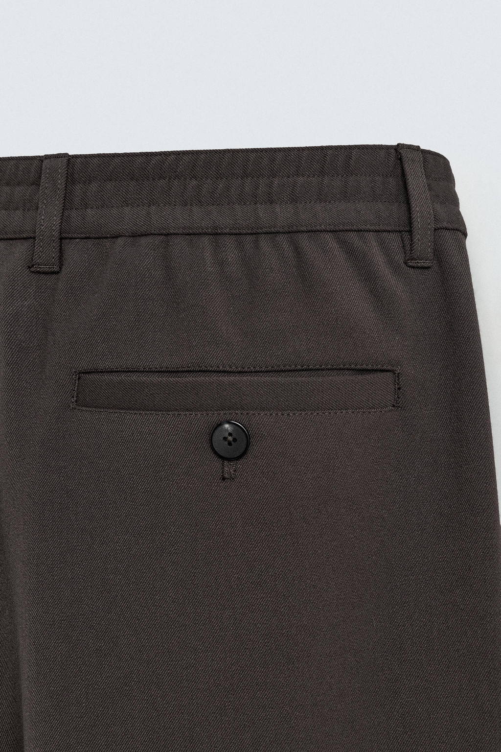 PLEATED TEXTURED TROUSERS