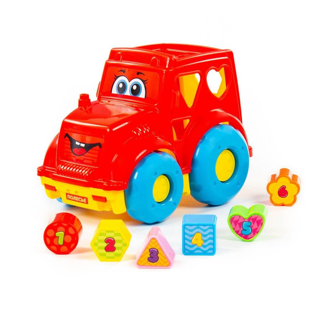 Игрушка развивающая Трактор (в сеточке)