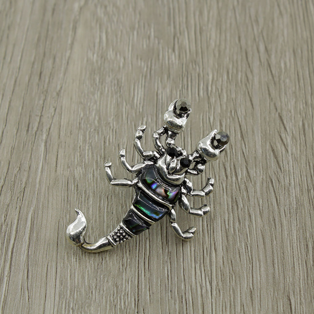 Брошь "Скорпион" гелиотис