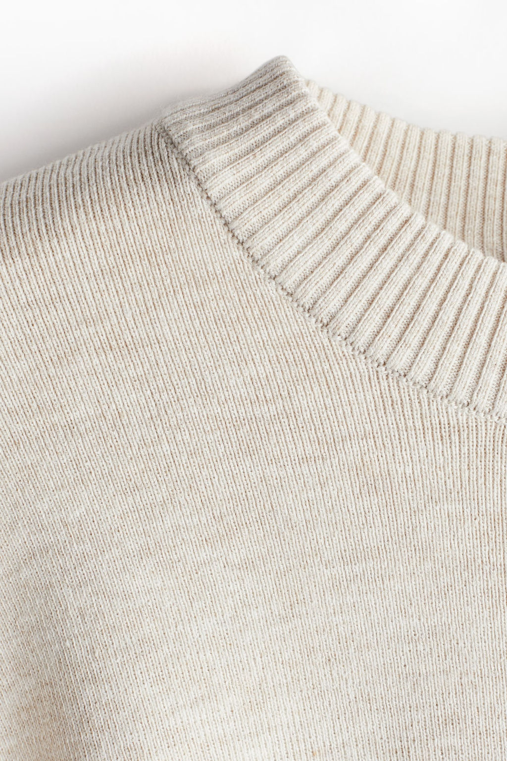 Jersey oversize con bajo redondeado