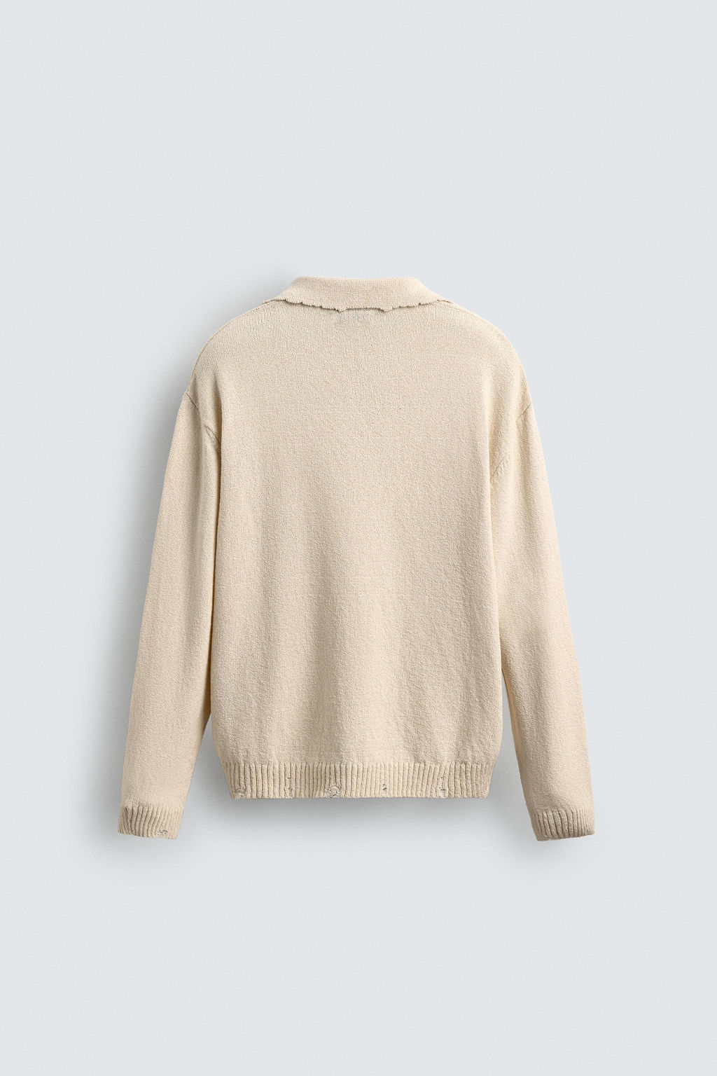 KNITTED RIPPED-EFFECT POLO SHIRT