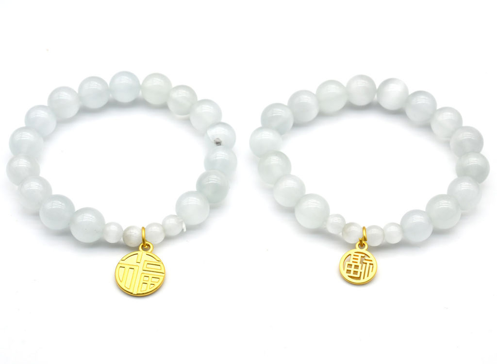 Браслет из кошачьего глаза шарик 6; 10мм цв.белый