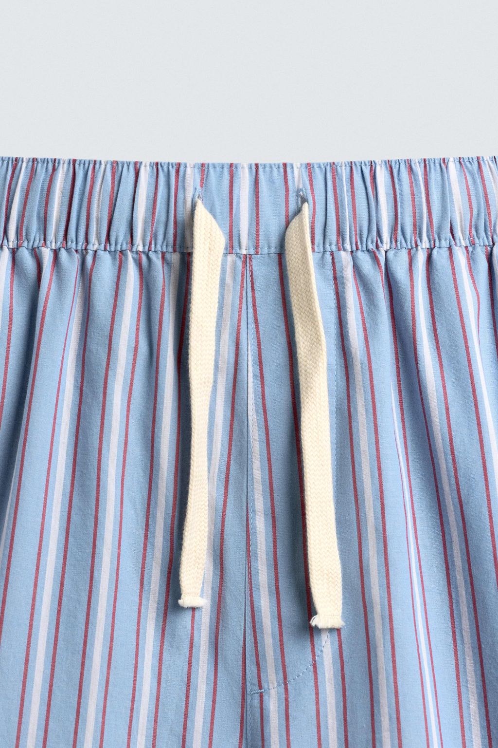 STRIPED OVERSIZE FIT TROUSERS
